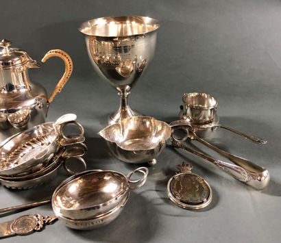 null Silver lot including : 


- a cup


- a coffee pot


- a timbale with a number...