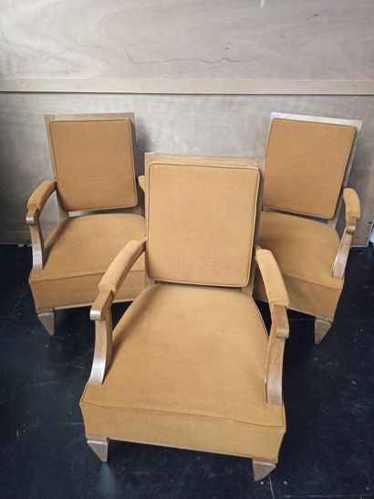 null Suite of three armchairs in moulded ceruse oak. Front legs sheath and back legs...