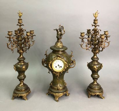 null Mantelpiece set


In painted and gilded regula, including two five lights candelabras...