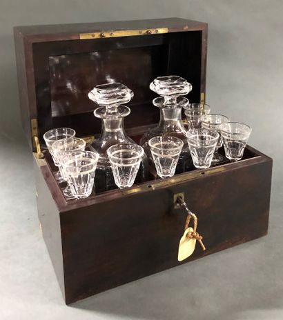 null Wooden liquor cabinet including two decanters and their stoppers and 9 glass...