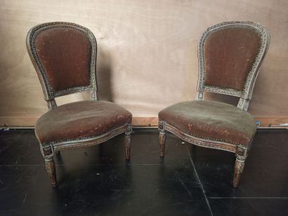 Pair of low chairs in carved and moulded...