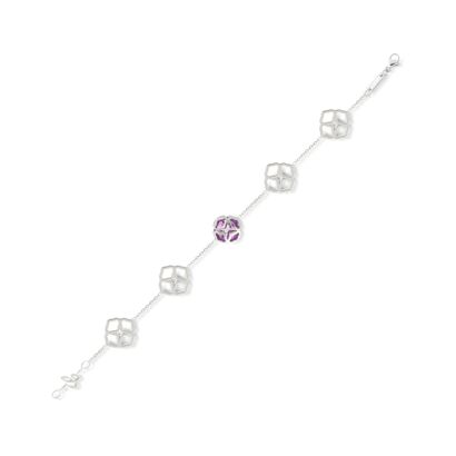 null Chopard.

Bracelet with arabesque motifs in 18K white gold 750/1000th holding...