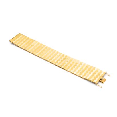 Bracelet en or jaune 18K 750/1000ème.

Longueur:...