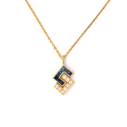 null Pendant in 18K yellow gold 750/1000 set with diamonds and sapphires, with a...