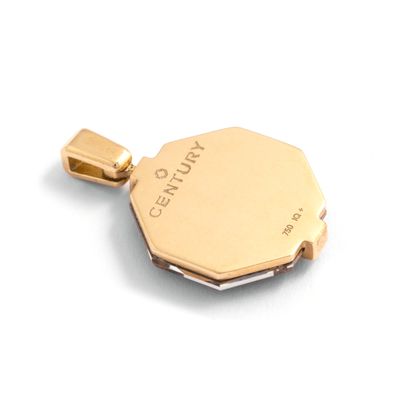 null Century.

An 18K yellow gold pendant holding an octagonal faceted stone and...