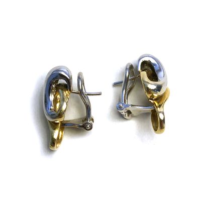 null Pair of ear clips in 18K white and yellow gold 750/1000.

Gross weight: 10.88...