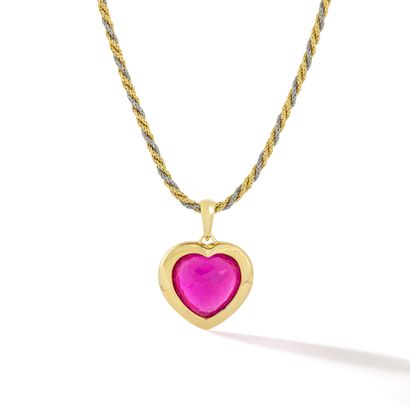 null Pendant representing a heart in 18K yellow gold 750/1000th centered by a rubellite...