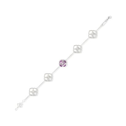 null Chopard.

Bracelet with arabesque motifs in 18K white gold 750/1000th holding...