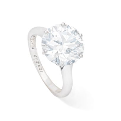 null 
Chaumet.





Solitaire ring in 18K white gold centered with a large round...