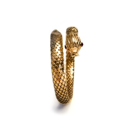 null Bracelet représentant un serpent en or jaune 18K 750/1000ème.

Poids brut: 45.00...