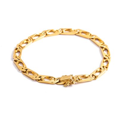 null Bracelet chaine en or jaune 18K 750/1000ème.

Longueur: 19.00 cm. Epaisseur:...