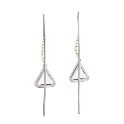 null A pair of platinum and white gold earrings holding small pearls and a large...