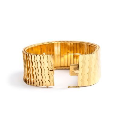 null Bracelet en or jaune 18K 750/1000ème.

Longueur: 19.00 cm. Largeur: 3.00 cm.

Poids...