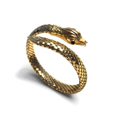 null Bracelet représentant un serpent en or jaune 18K 750/1000ème.

Poids brut: 45.00...