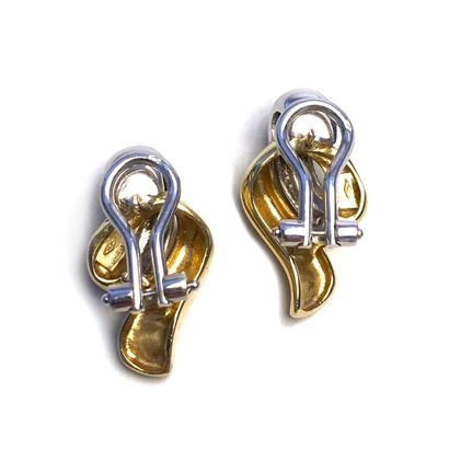 null Pair of ear clips in 18K white and yellow gold 750/1000.

Gross weight: 10.88...