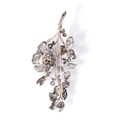 null Important gold and silver "trembleuse" flower brooch.

Late 19th century.

Length:...
