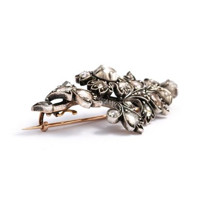 null Gold and silver floral brooch set with rose-cut diamonds.

Late 19th century.

Height:...