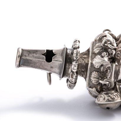 null Silver rattle and whistle, coral handle**.

English work. 18th century.

Length:...