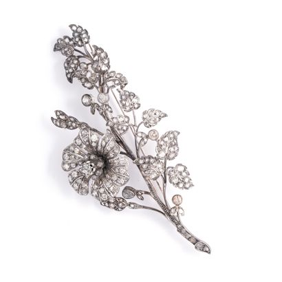 null Important gold and silver "trembleuse" flower brooch.

Late 19th century.

Length:...