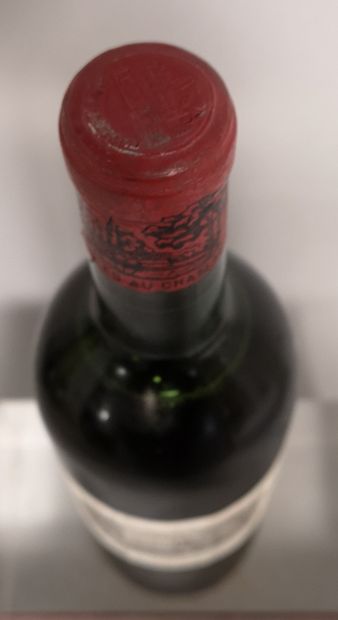 null 1 bouteille Château LAFITE ROTHSCHILD - 1er GCC Pauillac 1960 

Etiquette légèrement...