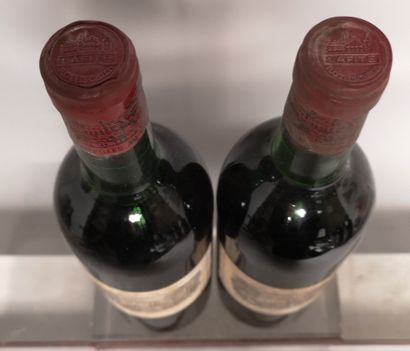 null 2 bottles Château LAFITE ROTHSCHILD - 1st GCC Pauillac 1973 

Slightly stained...