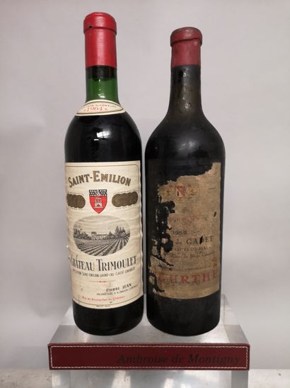 null 2 bottles BORDEAUX DIVERS FOR SALE AS IS 

1 Château TRIMOULET 1964 - Saint...