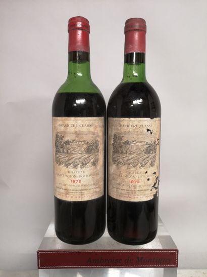 null 2 bottles Château DUHART MILON ROTHSCHILD - 4th GCC Pauillac 1973 

Stained...