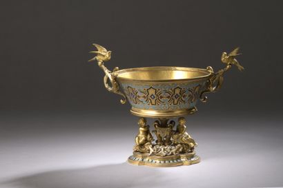 null Oval gilt bronze cup decorated with champlevé enamels, polylobed base decorated...