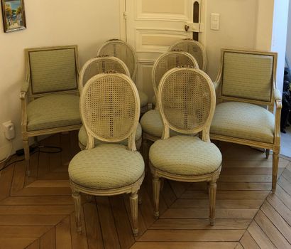 null Set of two armchairs and eight chairs in cream lacquered wood with a medallion...