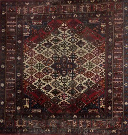 Persian carpet with a central hexagonal medallion...
