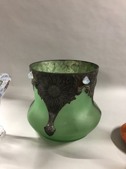 null Lot including:

- A large green tinted glass vase with metal frame with floral...