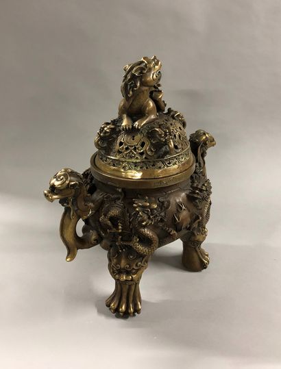 null Large ormolu and bronze incense burner decorated with dragons, dog in clouds,...