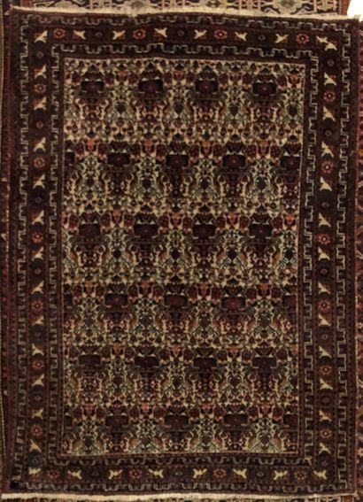 null Lot of five carpets including : 

- Carpet with pink geometric decoration on...