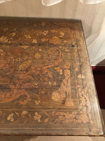 null Lot including: 

- An oak table with rich inlaid decoration of a flowering vase,...