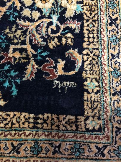 null Persian silk carpet decorated with a mosque lamp, tree of life on a black background,...
