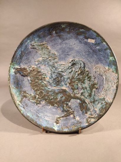 null Two large circular dishes, "the free horse race".

The horses were modeled in...