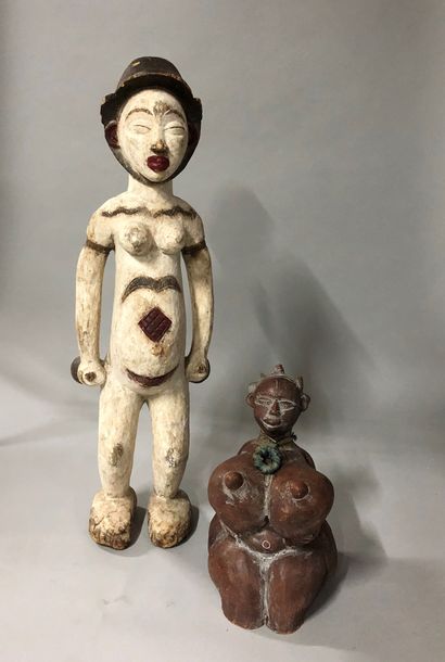 Lot including two African statuettes, one...