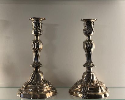 null Pair of candelabras with four silvered bronze arms, central shaft in removable...