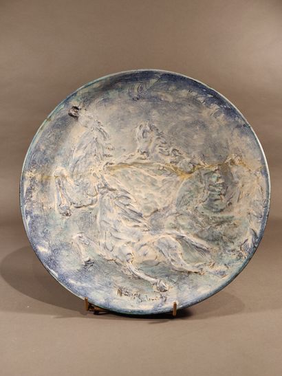 null Two large circular dishes, "the free horse race".

The horses were modeled in...