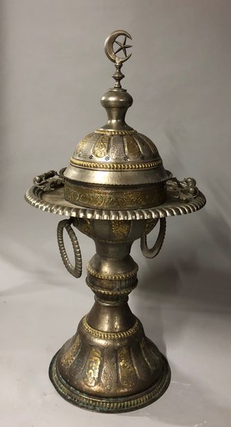 Lot including 
- A large silver and gilt...