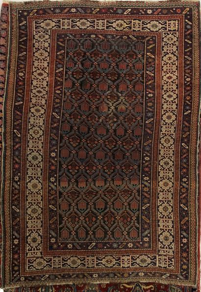 null Lot of five carpets including : 

- Carpet with pink geometric decoration on...