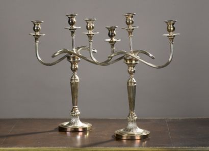 null Pair of candelabras in silver plated metal with three branches

of light. Tapered...