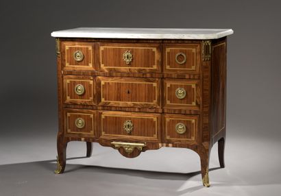 null COMMODE with slight central projection in rosewood veneer in frames of two-tone...