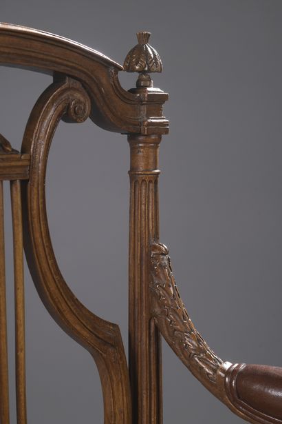 null PAIR OF ARMCHAIRS in molded and carved beech. Flat openwork backrest with lyre...
