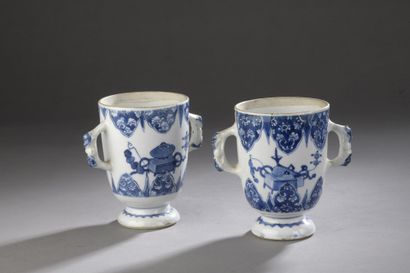 TWO POTS in porcelain with side handles decorated...