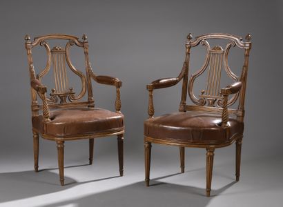 PAIR OF ARMCHAIRS in molded and carved beech....