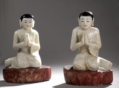 TWO alabaster STATUETTES with black and red...