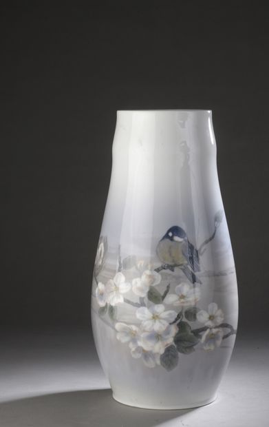 Porcelain vase with decoration of a blue...