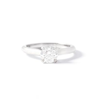 null 
Cartier




Platinum 
950‰ solitaire ring centered with a round diamond weighing...
