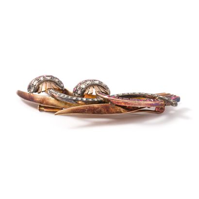 null 14K gold and 800‰ silver brooch set with rose-cut rubies and diamonds.

Accidents...